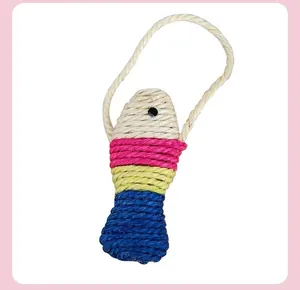 Close-up detail of a colorful sisal fish cat toy showing the durable woven fiber texture