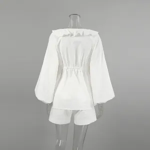 Detailed back view of white cotton linen puff sleeve top and matching shorts set