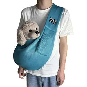 Breathable teal mesh pet sling carrier for small dogs and cats, comfortable crossbody design