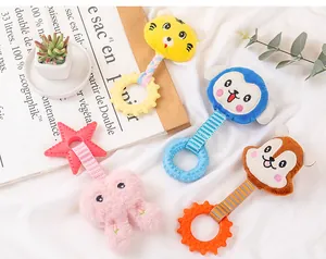 Detailed view of colorful cartoon plush dog chew toys with textured TPR rings