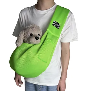 Close-up view of a breathable bright green mesh pet sling carrier for summer trips