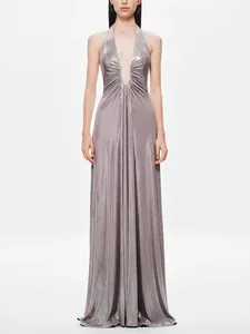 Elegant metallic silver halter maxi dress with deep V-neckline and draped details.