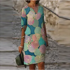 Vintage V-neck midi dress with artistic floral print and 3/4 sleeves for women.
