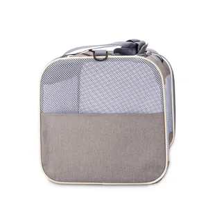 Bolsa de transporte transpirable de malla gris para gatos y perros pequeños con correa