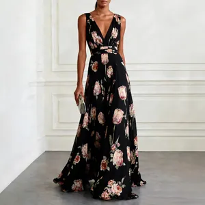 Detail view of sleeveless V-neck long dress with elegant tulip floral print on black background