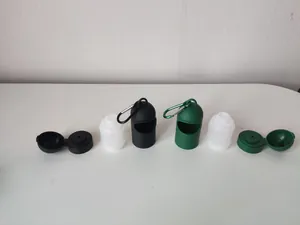 Detail view showing multi-functional pet outing dispenser components in black and green