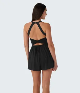 Back view of a chic black sleeveless backless romper with elegant strappy cutout detail