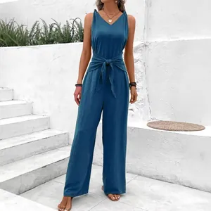 Stylish V-neck sleeveless wide-leg jumpsuit with waist tie in deep blue color.