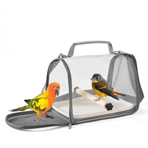 Portable transparent bird carrier with breathable mesh sides, wooden perch and tray