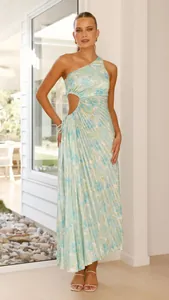Detail of elegant one-shoulder floral maxi dress with pleated texture and side cut-out