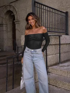 Sexy black off-shoulder long sleeve bodysuit with sparkling sequin bust detail