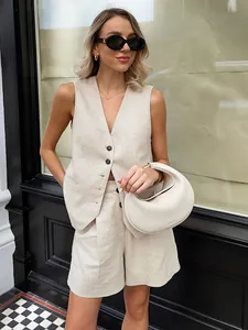 Elegant khaki linen sleeveless vest and matching shorts set in chic old money style