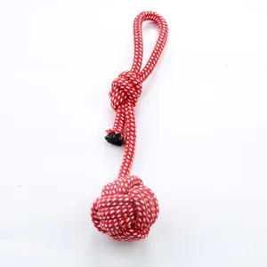 Durable red and white braided cotton rope ball dog toy for aggressive chewers