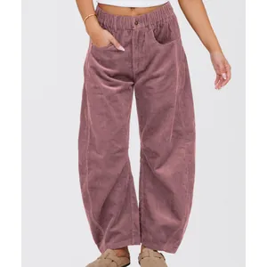 Detail of women's mauve high waist corduroy loose straight leg casual trousers.