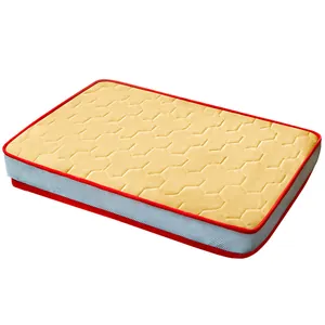 Quilted pet cooling mattress with red piping and breathable mesh sides for cats and dogs