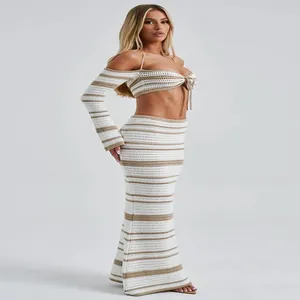 Detailed look of striped crochet two-piece set featuring halter top and maxi skirt