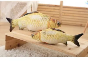 Close-up of realistic simulation fish catnip plush toys in two different sizes