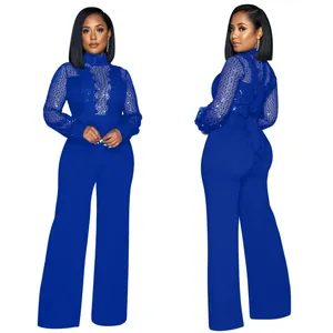 Elegante mono de lentejuelas azul real con mangas de encaje transparente para gala