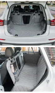 Detailed view of waterproof car pet mat installed in trunk and back seat for SUVs.