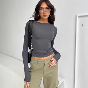 Stylish slim fit women's grey long sleeve t-shirt featuring a minimalist streetwear design