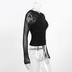 Detail view of black ruched slim-fit T-shirt with sheer mesh sleeves and texture.