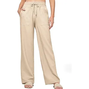 Detail view of khaki high waist wide leg linen pants with drawstring and front pockets