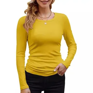 Detailed view of women's yellow ribbed long sleeve T-shirt with crew neck and slim fit