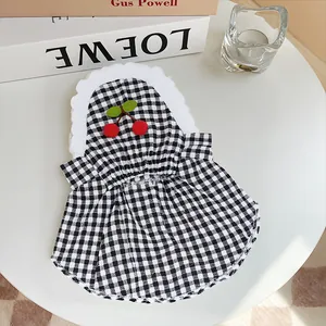 Black and white checkered summer pet dress with white lace collar and cherry accent.