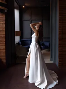 Elegant vintage French white backless evening gown with high slit and long train