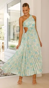 Detail shot of a one-shoulder floral pleated maxi dress with waist cutout detail