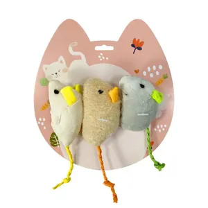 Set of three colorful plush mouse toys for cats mounted on pink cat-shaped card