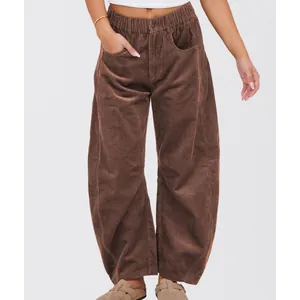 Women's high waist brown corduroy trousers in loose straight fit for autumn casual style
