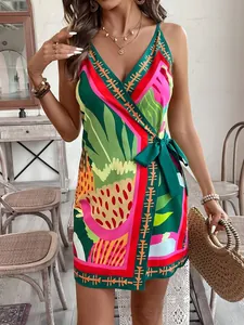 Close-up of tropical floral print on a sexy V-neck tie-waist camisole dress.