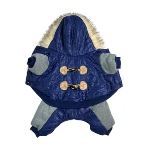 Blue padded pet winter coat featuring a fur hood and classic toggle buttons for small dogs