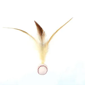 Detailed view of cat teaser toy featuring a baseball bouncy ball and natural feathers