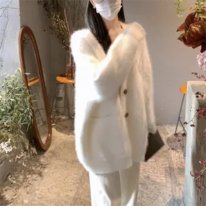 Soft white faux mink fleece long cardigan sweater with an oversized fit and cozy pockets