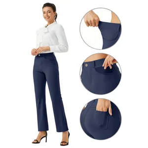 Detail view of navy blue straight-leg pants featuring elastic waist and pockets