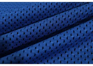 Macro view of blue breathable mesh lining for men's sports shorts fabric