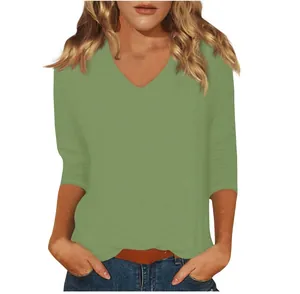 Close-up view of a women's casual sage green V-neck T-shirt with 3/4 sleeves