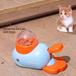 Whale shaped interactive pet treat launcher toy for cats and dogs