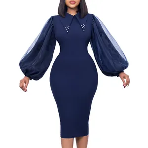 Elegant navy blue pencil dress featuring sheer mesh lantern sleeves and beaded collar detail