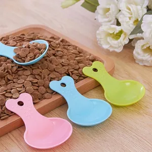 Candy-colored plastic food scoops for hamsters, dogs, and cats, set of three colors.
