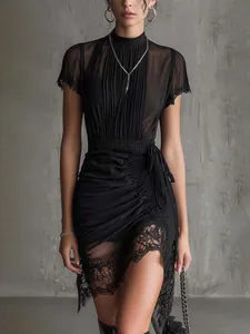 Elegant black sheer lace patchwork dress with slim fit design and high slit detail
