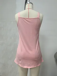 Detailed back view of a pink sleeveless camisole tank top displayed on a mannequin.