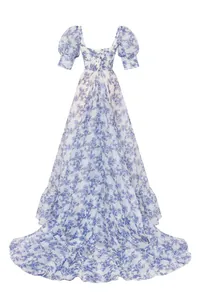 Detailed view of an ethereal organza floral evening gown with puff sleeves and lace-up back