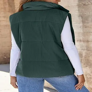 Detailed back view of a dark green corduroy puffer vest for women in autumn style