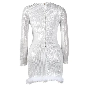 Back view of white sequined bodycon mini dress with feather hem and zipper closure