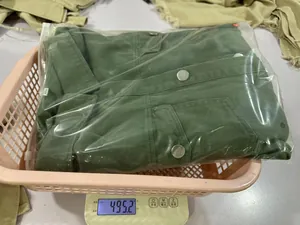 Green washed denim shirt jacket weight measurement on electronic scale 495g women