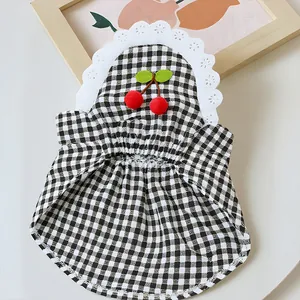 Sweet black and white checkered pet dress with cherry decor and white lace collar.