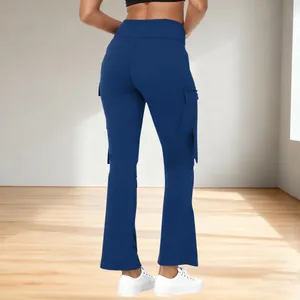 Back view of navy blue high-waisted yoga cargo pants with side pockets on model